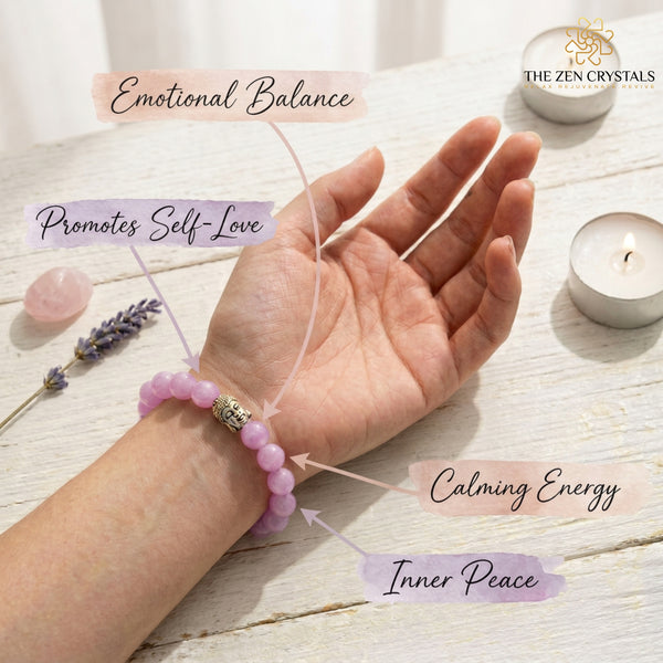 Hand wearing a kunzite beaded bracelet with text on emotional balance, self-love, calming energy, and inner peace, set against a white background with candles and lavender.