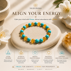 Zen crystals bracelet with turquoise and cjitrine beads on a stone surface with flowers and crystals.