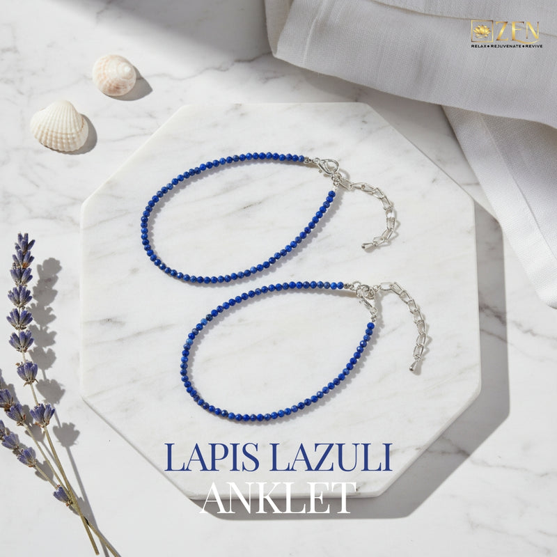 Lapis lazuli anklet on a marble surface with lavender and shells