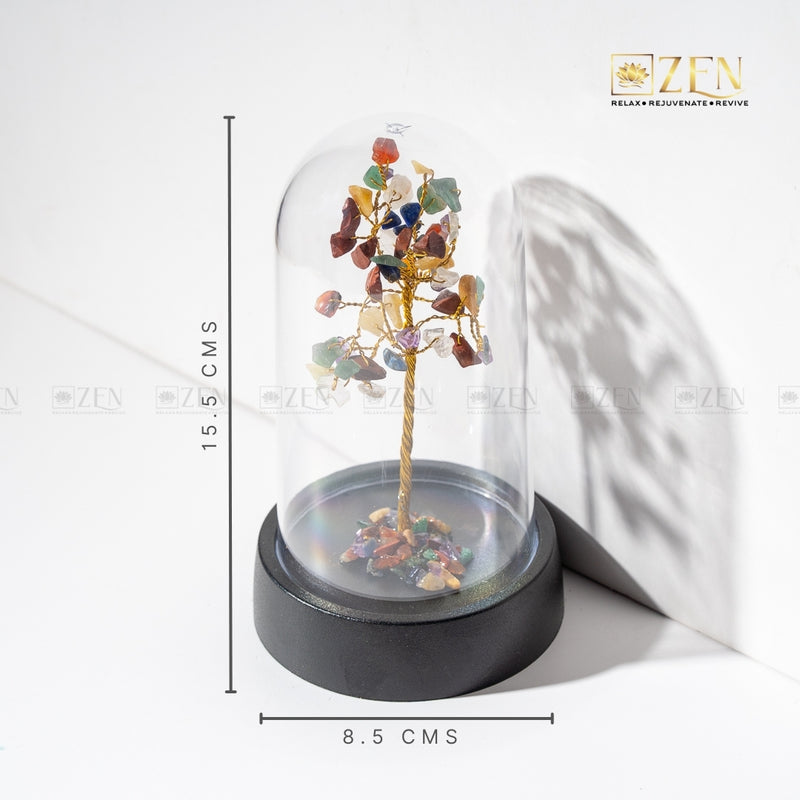 Decorative tree with multicolored stones under a glass dome on a white background, with 'Zen' branding.
