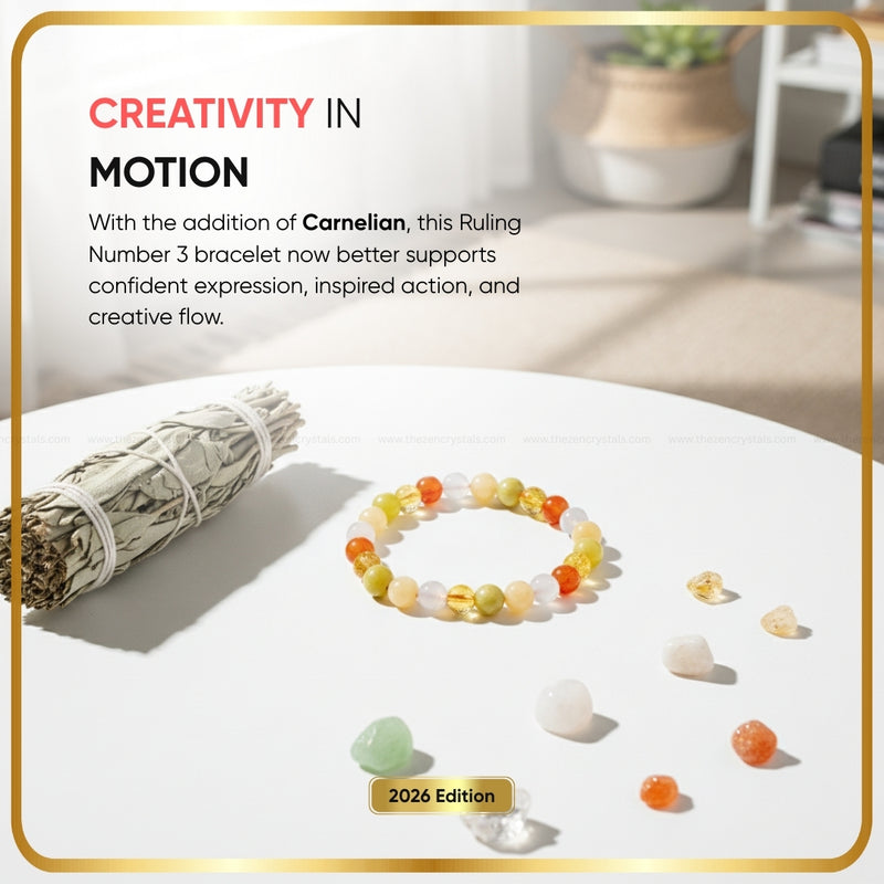 Ruling Number (मूलांक) 3 Bracelet on a white surface with text about creativity and motion.