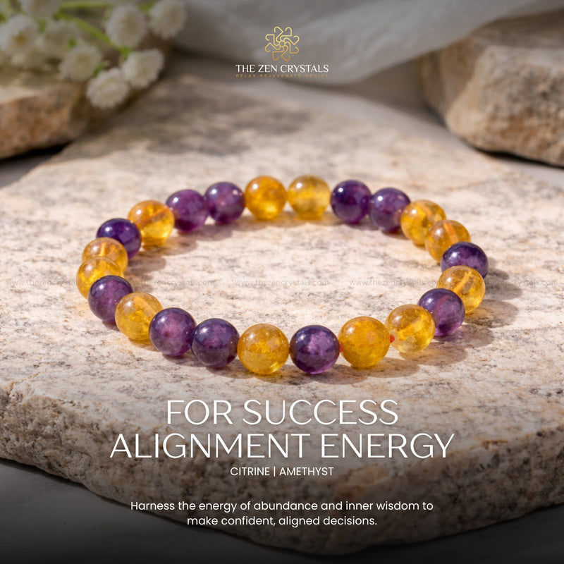 Success Alignment Energy Bracelet with citrine and amethyst stones on a stone surface, branded 'The Zen Crystals'.
