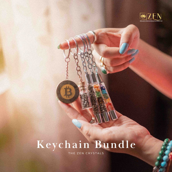 Hand holding a keychain bundle with 'ZEN' branding