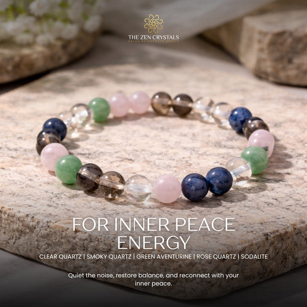 Inner Peace Energy Bracelet with various colored beads on a stone surface, featuring 'The Zen Crystals' brand.
