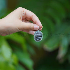 Black tourmaline pendant benefits the zen crystals