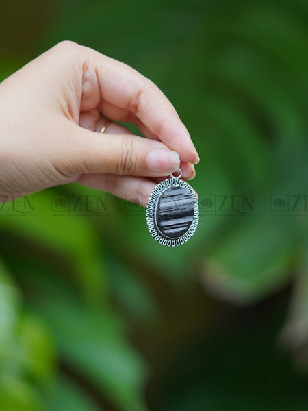 Black tourmaline pendant benefits the zen crystals