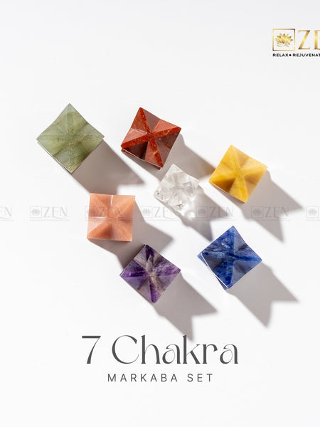 Set of seven colorful crystal stones arranged in a circle on a white background with 'Zen' brand logo.