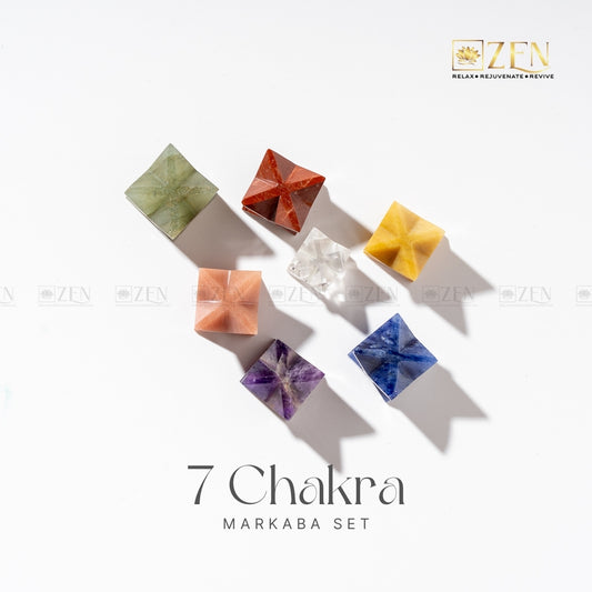 Set of seven colorful crystal stones arranged in a circle on a white background with 'Zen' brand logo.