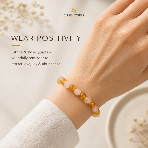 close up of person wearing rose quartz and citrine bracelet | the zen crystals