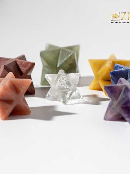 clear quartz merkaba on a white background with 'Zen' brand logo.