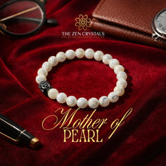MOther of Pearl bracelet on a red fabric background with 'The Zen Crystals' branding.