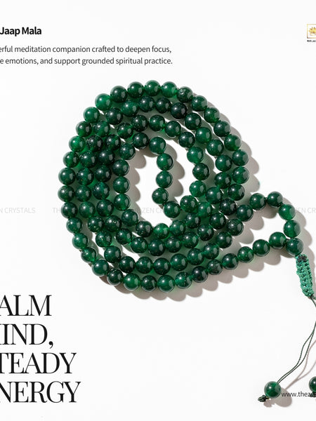 Jade meditation mala beads with tassel on a white background, featuring text about its benefits.