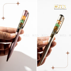 Close-up of Money Magnet - Ballpoint Pen showing Pyrite, Tiger Eye, Green Aventurine, and Citrine stones in clear chamber