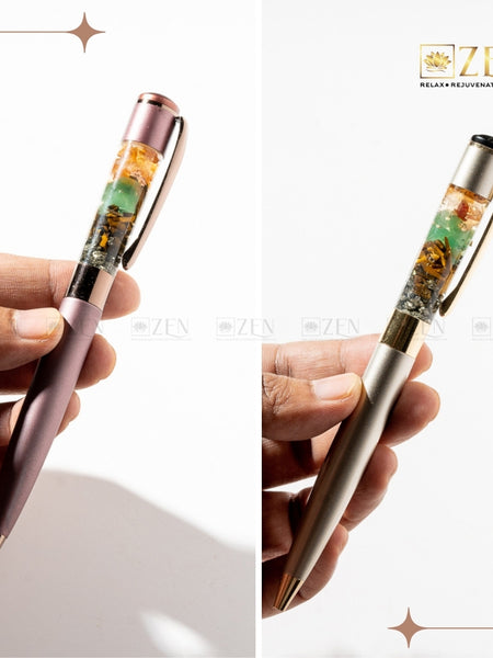 Close-up of Money Magnet - Ballpoint Pen showing Pyrite, Tiger Eye, Green Aventurine, and Citrine stones in clear chamber