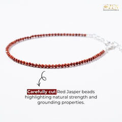 Red Jasper beaded necklace on a white background with text about natural strength and grounding properties.