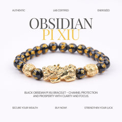 Black obsidian Pi Xiu bracelet with gold accents on a white background