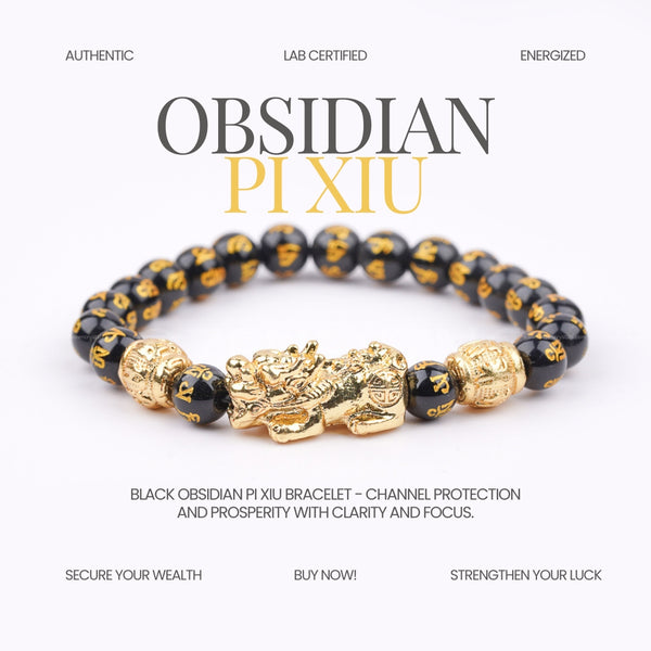 Black obsidian Pi Xiu bracelet with gold accents on a white background