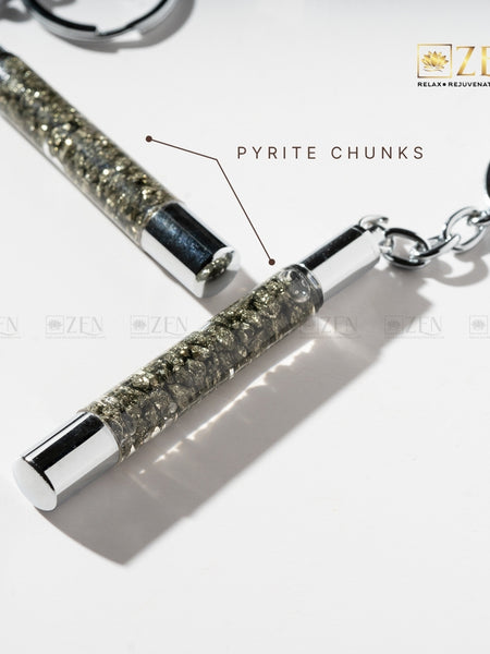 Close-up of Pyrite Slim Tube - Keychain showcasing golden pyrite crystals