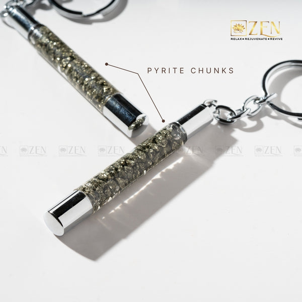Close-up of Pyrite Slim Tube - Keychain showcasing golden pyrite crystals