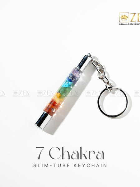 7 Chakra slim-tube keychain with colorful design on a white background