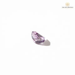 amethyst crystal on a white background with 'The Zen Crystals' logo.