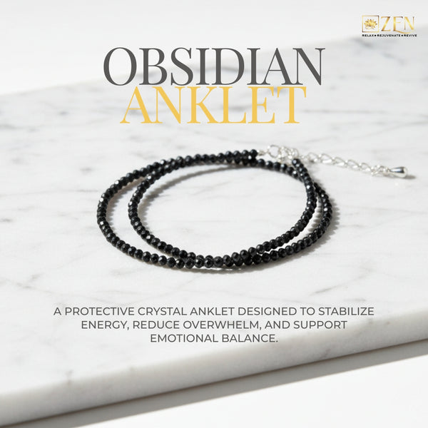 The Zen Crystals Obsidian anklet on a marble surface 