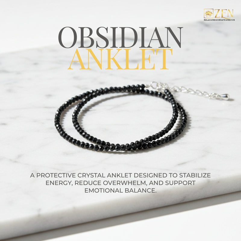The Zen Crystals Obsidian anklet on a marble surface 