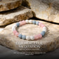 peaceful meditation bracelet on stones with 'The Zen Crystals' branding and text about peaceful meditation.