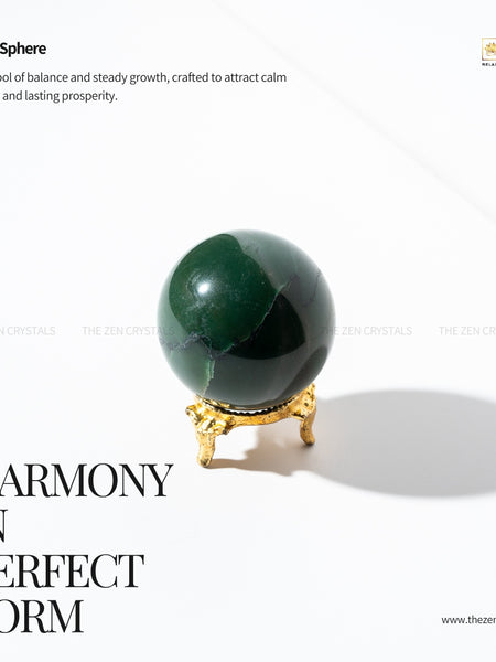 Green jade sphere on a gold stand with text about balance, growth, and calm energy.