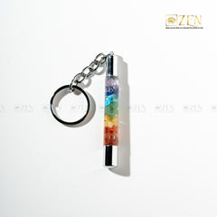 Colorful 7 chakra keychain with chakra stones on a white background, featuring the 'Zen' brand.