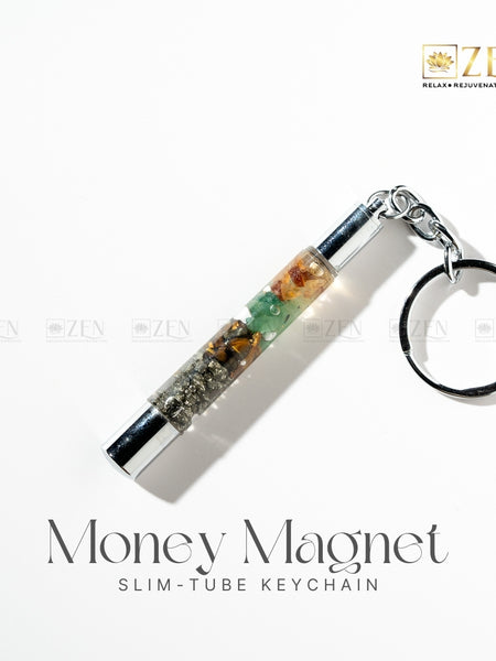 Money Magnet slim-tube keychain with crystals on a white background, featuring the ZEN brand.