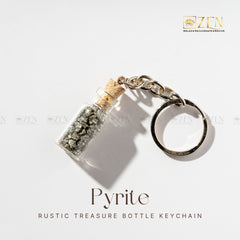 Pyrite Treasure Bottle - Keychain hanging on bag, symbolizing prosperity and positive energy.