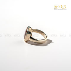 silver ring with a red jasper gemstone on a white background, featuring the 'Zen' brand.