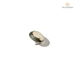 natural pyrite on a white background, branded 'The Zen Crystals'.