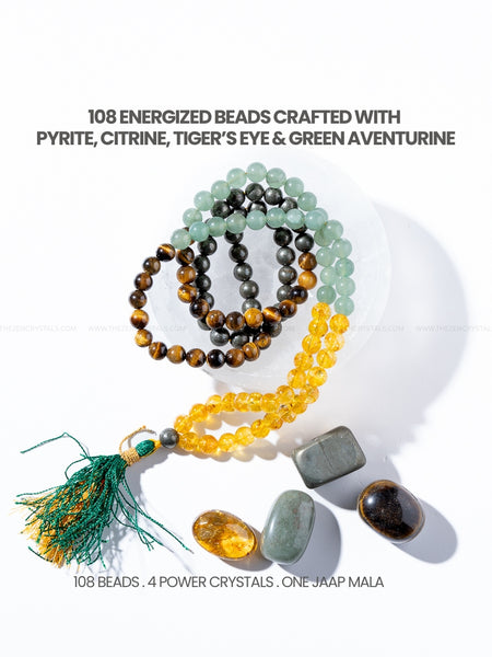 Money Magnet Jaap Mala beads with tassel and stones on a white background