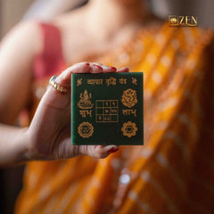 hand holding vyapar vridhi yantra by the zen crystals
