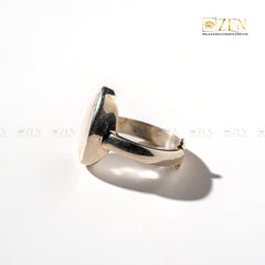 Side view of rose quartz Silver ring on a white background with 'Zen' brand logo.