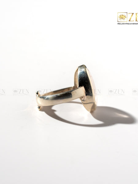 rose quartz silver ring with a side view on a white background with 'Zen' brand logo.