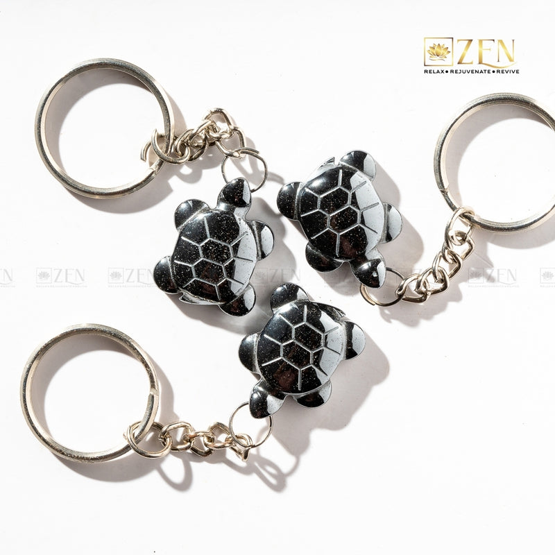 Hematite Turtle Keychain with metallic shine, symbolizing wisdom, stability, and emotional balance.