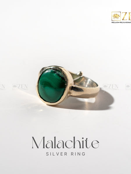 Silver ring with Malachite gemstone on a white background, featuring the brand 'Zen'.