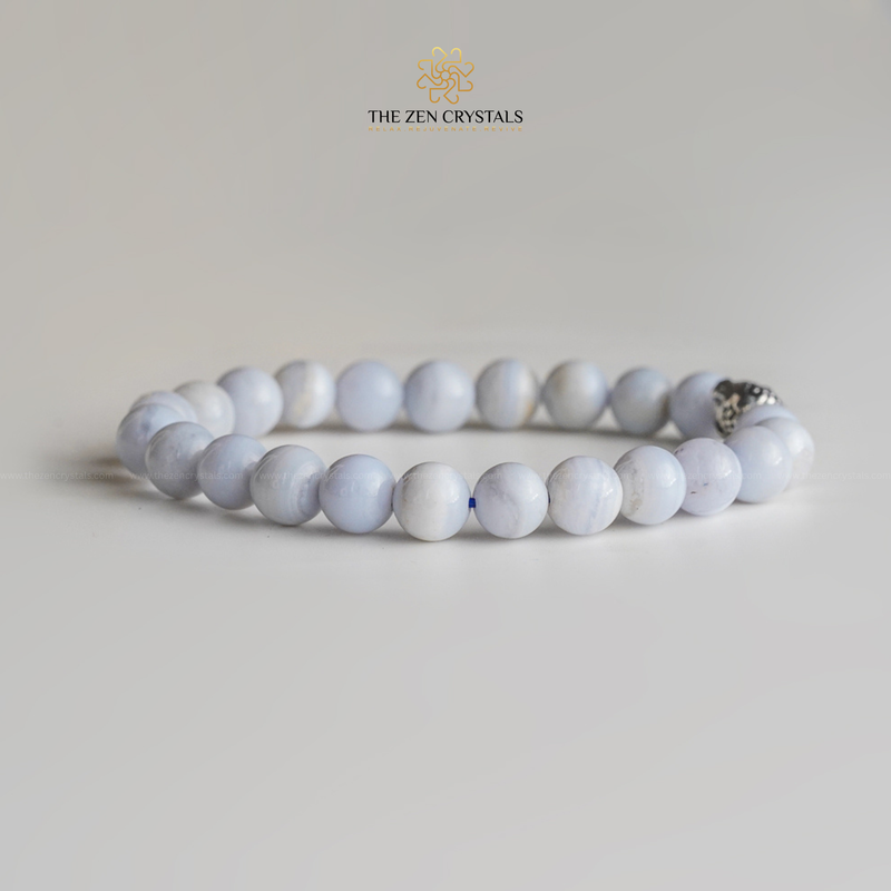 Blue lace agate bracelet on a light gray background with 'The Zen Crystals' logo.