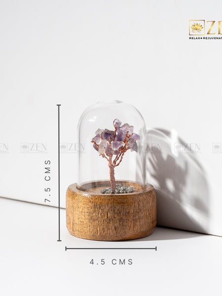 Decorative tree in a glass dome on a wooden base with measurements.