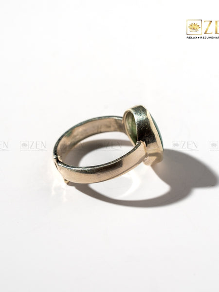 Silver ring of Malachite gemstone on a white background with 'Zen' brand logo.