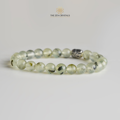 prehnite bracelet on a light gray background with 'The Zen Crystals' branding.