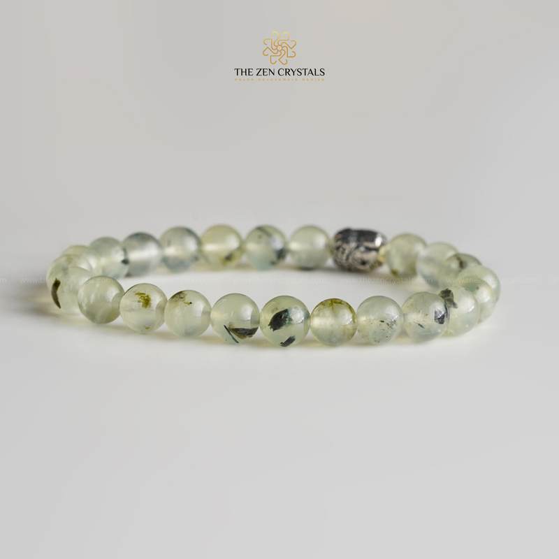 prehnite bracelet on a light gray background with 'The Zen Crystals' branding.