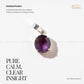 Amethyst pendant with silver setting on a white background, featuring text about its properties.