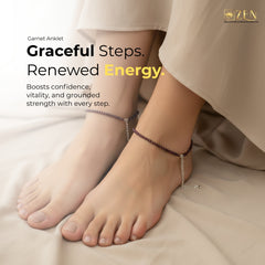 Woman wearing a Garnet Anklet on her feet, showcasing confidence, vitality, and elegant everyday wear.