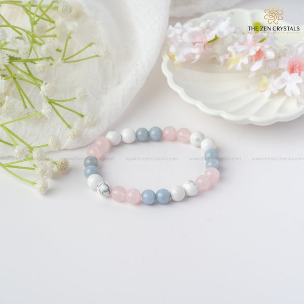 peaceful meditation bracelet with pastel colors on a white background with flowers