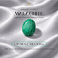 Malachite stone on a silver fabric background with promotional text.