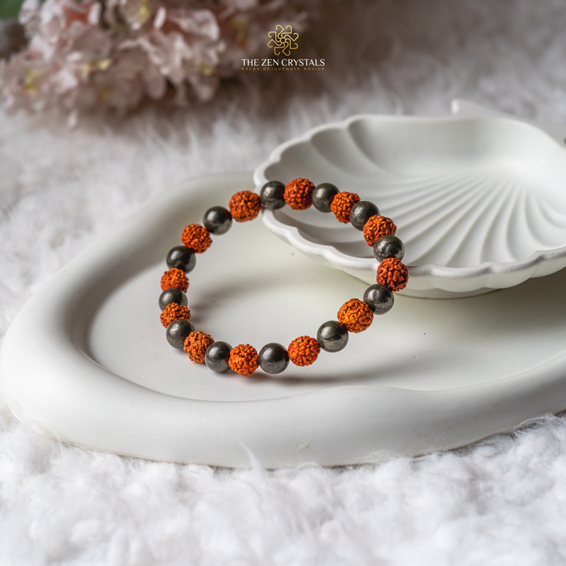 rudraksha and pyrite Bracelet beads on a white shell with 'The Zen Crystals' logo.
